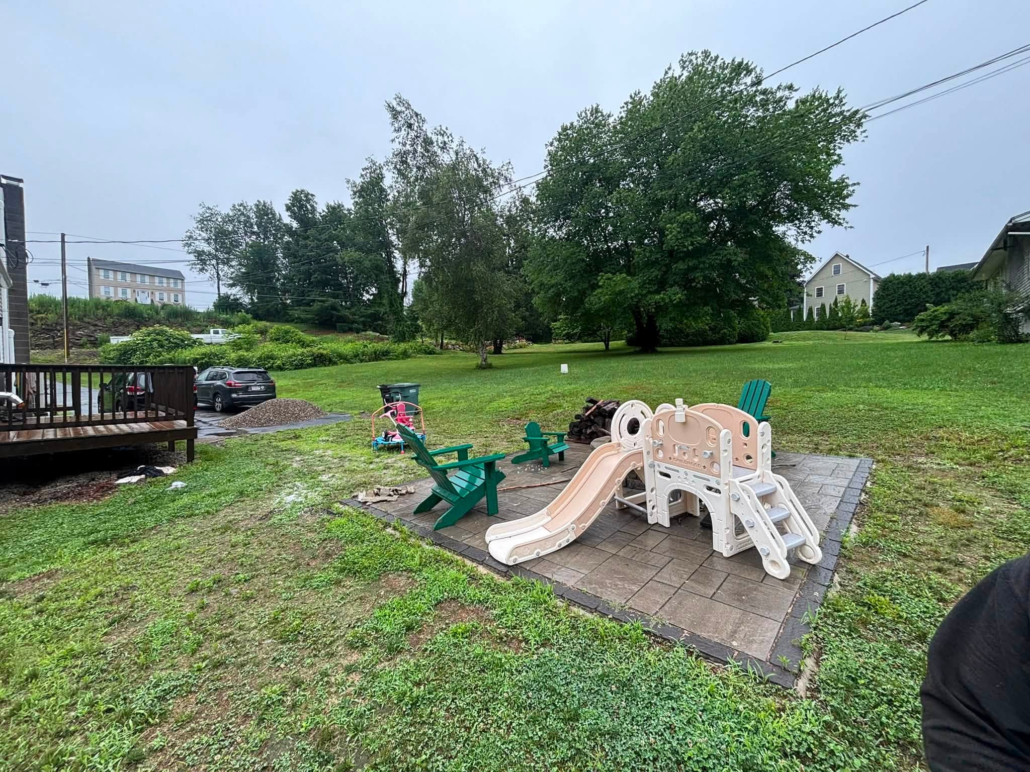 Bare ground and drainage issues before stone walkway installation